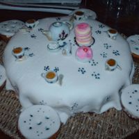 Tea For Six The birthday cake for one of my friends. We were joking around one day about how cool it would be to have a tea party for one of our...