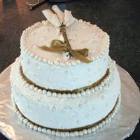 Calla Lillies And Ribbons It looks the same as a cake i've done before. I'm just trying to perfect the cake, and try different techniques before doing my...