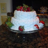 Birthday Cake White basket weave cake with white chocolate dipped strawberries.