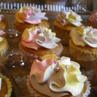 Pink, Blue, Yellow Cupcakes Mixed Color Cupcakes! I like mixing the colors. I don't have an airbrush machine, so I mix it up.