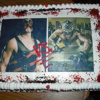 Wresting Cake - Rey Misterio & Kane A wrestling cake with edible image. Pics were of the old Kane, but the Birthday boy didn't mine, he loved it.