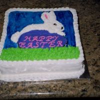 Easter Cake I made this cake last Easter to take to my in-law's. It is a 10 inch vanilla cake frosted in BC. The bunny and egg was a gel transfer...
