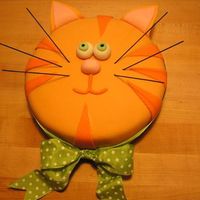 Orange Tabby Cat Cake Everything on this cake is edible except for the green polka-dot bow, which is actual ribbon. The whiskers are make of thin spaghetti that...