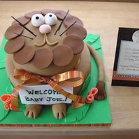 Baby Shower Cake - Jungle Theme The color scheme was somewhat inspired by the invitation (at right). His whiskers are made out of spaghetti painted with food coloring.