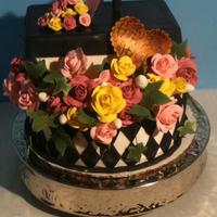 Pamela's Shoe Cake Design taken from someone else. I am VERY PROUD of this cake. My first one to turn out with no complications. It's amazing how flowers...