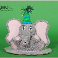 Zachary's Elephant This is a vanilla pound cake elephant made from the 3D Bear pan. Buttercream frosting. Legs and trunk formed from fondant. Hat is a frosted...