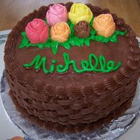 Practice Cake Chocolate cake with caramel filling and chocolate BC decorated with Starburst roses. Still practicing on those roses so I figured i'd...