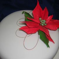 Ponsettia Christmas piece I done using gumpaste.