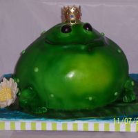 Frog Prince Frog prince sitting on a lily pad with gum paste waterlilly. What fun I had doing this cake. Thanks for looking