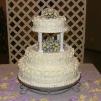 First Wedding Cake This was the first wedding cake I've ever done. I just finished setting it up and I'm anxious for the big day tomorrow! As nerve...