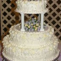 First Wedding Cake 2 Here's a better picture of the cake. Hopefully you can see the details a little clearer.