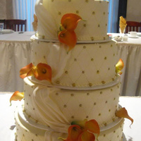 Orange Sunset This cake was delivered in a horrendous rainstorm. I can't believe it survived the trip!It took me twice as long to arrive at the...