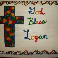 1St_Communion.jpg The cross was done with sparkle gels and the icing is whipped cream. It was for my sons First Comminion. Not my best, but he liked it!