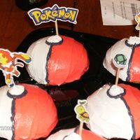 Pokemon Cupcakes Balls were made out of half mini ball pan and whipped cream icing. The Picks were stickers put on card board and tooth picks