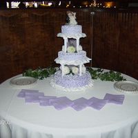 25Th Wedding Anniversary Cake done in all whipped cream icing and white fake rose petals