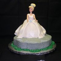 Cinderella For 3 Yr Old Birthday Cinderella is dressed in a fondant gown covered in Luster dust. Her petticoat is visible in several places. She is standing on the castle...