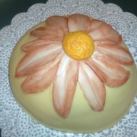 Sunflower/daisy??? I made this little baby cake for my DH boss and his wife. Dh laughed and said it looked like a boob! After looking at the pics...it does...