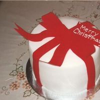 Christmas Cake I DID THIS FOR A FRIEND OF MINE WHO'S SISTER WAS COMING IN OUT OF TOWN AND SHE LOVES CAKES SO MY FRIEND ORDERED A CAKE FOR HER SISTER...