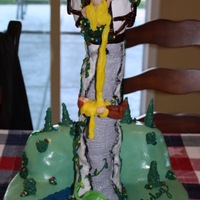 Tangled Cake Tangled cake for sixth bday. base and hills ar black and white cake. Tower is RKT, figures are MC. Super fun to make
