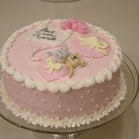 Baby Shower Cake This is my first baby shower cake. It is made from buttercream and MMF! I loved making this cake!