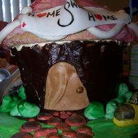 Home Sweet Home WIltons large cupcake pan, used poured fondant on 'roof', I must have gotten it wrong, it was hard as a rock. Everything else is...