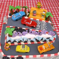 Cars And Garfield Rolled fondant for the covering, tires and the trees.