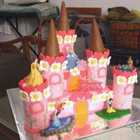 Castle Cake Very simple and quick, I used rolled fondant to cover the entire cakes, towers and the turrets, and royal icing for the ivies...