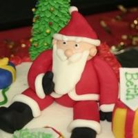 Close Up Of Santa Close up of Santa from the Christmas Birthdays Cake. He was pretty easy to make and made from fondant.