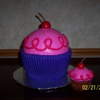 Pinkalicious Cuppies Pinkalicious cake shaped like cupcake for guests and personal Pinkalicious cupcake for birthday girl.