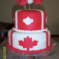 Canada Day Cake 2007 This cake is an 8" and 6" red velvet cake covered in fondant with fondant decorations.