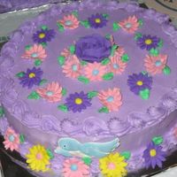 Purple Birthday Cake Chocolate cake, bc icing & royal flowers