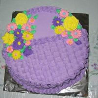 Purple Basket Of Flowers Purple Yam cake filled with purple yam jam... BC and royal icing flowers....