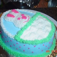 Bunny Cake This is 2 oval pans with a bunny "cupcake" on top. All decorated with BC