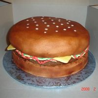 Cakes By Tonya three 10" yellow cakes patty covered in chocolate,airbrushed bun all bc. TFL