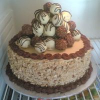 Coffee&chocolate Cake I made this cake for my mum for her birthday tomorrow. It's a coffee and chocolate cake stacked, filled and covered in coffee...