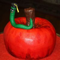 Teacher Graduate Degree Cake Red Velvet cake baked in a bundt and a wilton contoured bottom pan, placed together and carved slightly on the bottom. Stem is rice crispy...