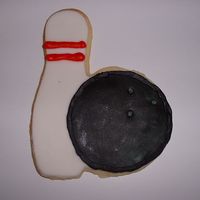 Bowling Cookies These were done for a bowling party, of course. Rolled white fondant with the ball painted black. I used black gel coloring mixed with...
