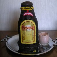 Kahlua & Cream 3-D Kahlua bottle iced in buttercream, with a glass of a creamy confectionary concoction next to it to resemble Kahlua. Flavoured with...