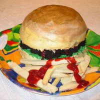 Burger & Fries Hamburger cake, covered in BC. Lettuce is coconut. Fries are sugar cookies, "ketchup" is raspberry sauce.