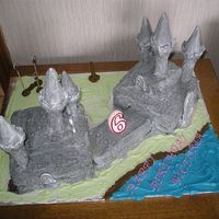 Hogwarts All 3 buildings, complete with lake, Quidditch, and a very sorry looking whomping willow. My daughter helped, as it was for her 6th...