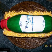 Bottle Of Wine Omg this was a challenge it looks kind of like a 40 bottle I couldnt get the cake to do what I wanted it to, I wanted to use a pound cake...