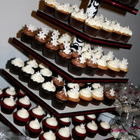 Holiday Cupcake Tower 100 cupcakes for the event and 100 packaged to go.
