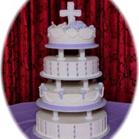 Cross And Dove this cake served 175 people. it was for a baptism. i like the way it turned out. i had some problems with the dove.