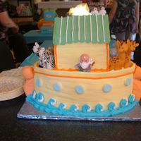 Noah's Ark The cake is all fondant with the Noah's Ark decopak kit figures on top. I made the colors of the ark match the invitations,