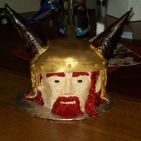 Viking Head I made this for my friend's birthday. The face and hair is buttercream. The helmet is fondant.