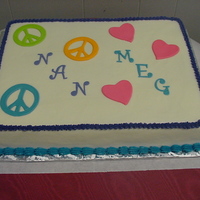 Nan And Meg Birthday cake for twins. Covered in buttercream w/ fondant accents.