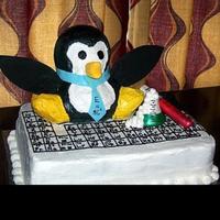 Scientist Penguin This was made for a groom's cake. He is a science teacher that loves penguins :) They are hard to see but he is sitting on part of the...