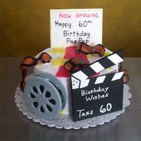 Movie Night This is one of my favorites. The decorations are all made out of gum paste. My directions on how to make this cake are here http://www....