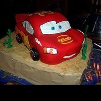 3D Lightning Mcqueen Cake I made this for my son's 2nd birthday. The car is covered in fondant I piped the details with butter cream. My instructions on how to...