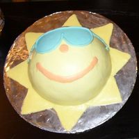 Sun Cake I used the wilton ball cake pan and buttercream frosting